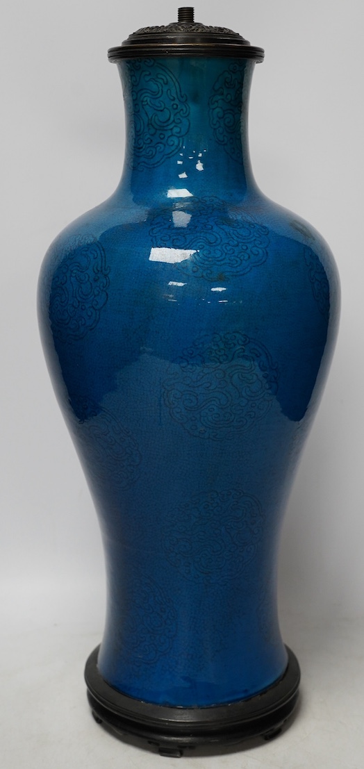 A Chinese blue glazed vase converted to a lamp base, 47cm high. Condition - fair, crazing throughout